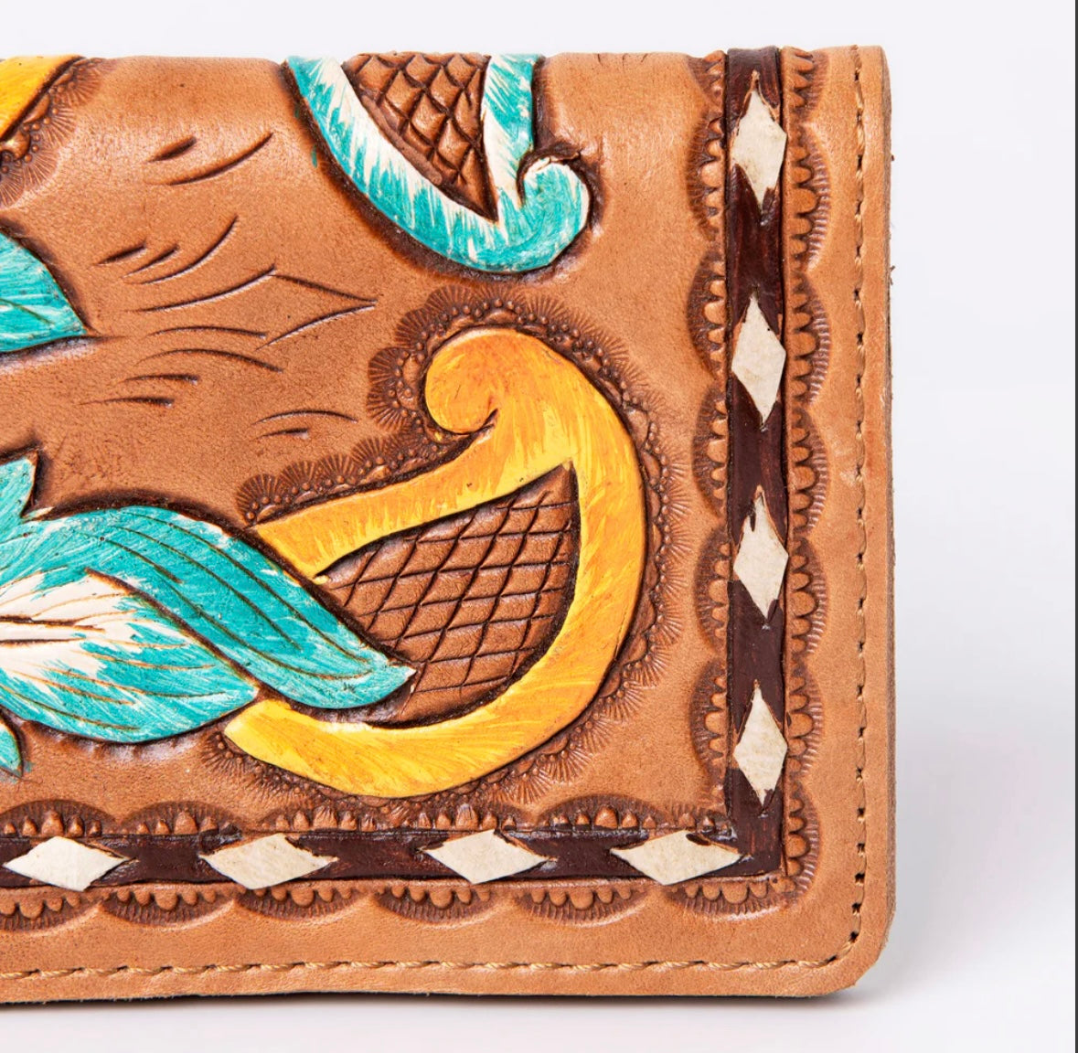 Feather tooled wallet